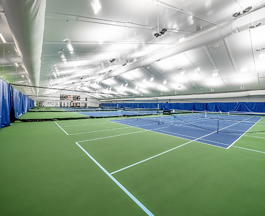 lined and insulated tension fabric tennis building