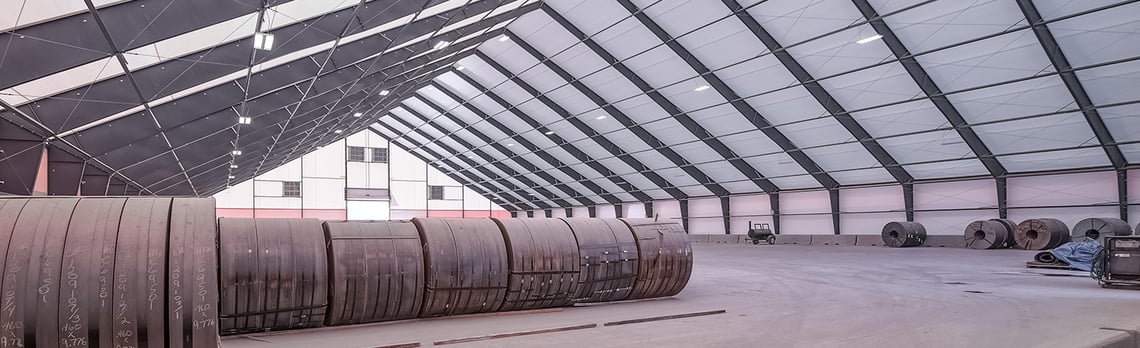 cold steel storage inside a tension fabric building at a port