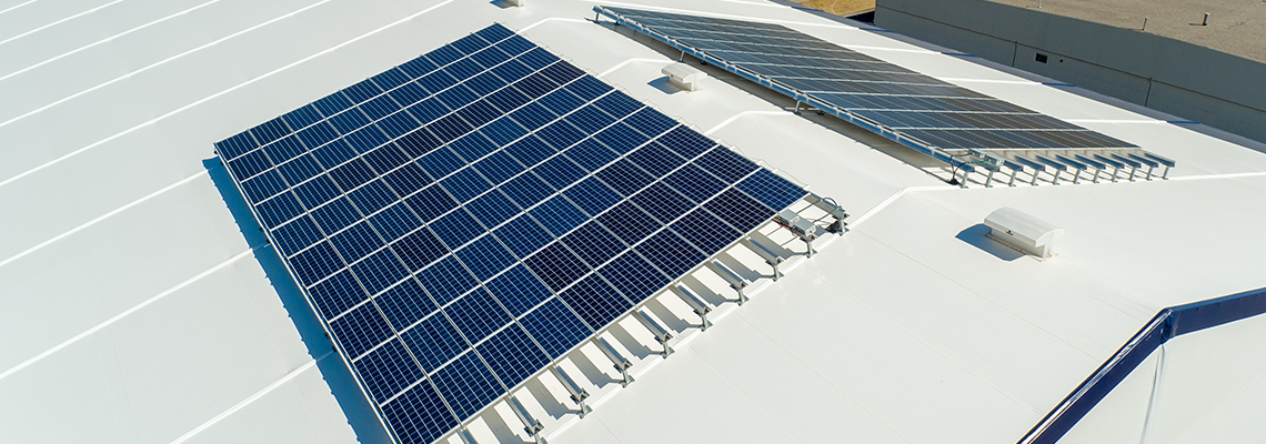solar panels on top of tension fabric aircraft hangar