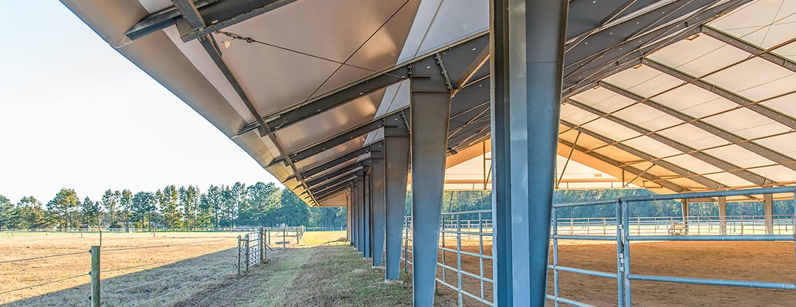 extended eave on tension fabric horse arena
