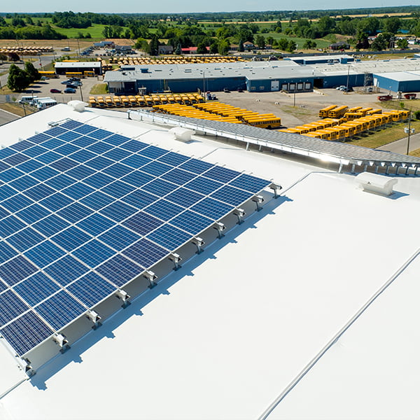 solar panels on top of a fabric aircraft assembly hangar in Ontario